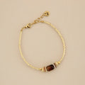 Pulsera Malo de ágata y cuentas doradas