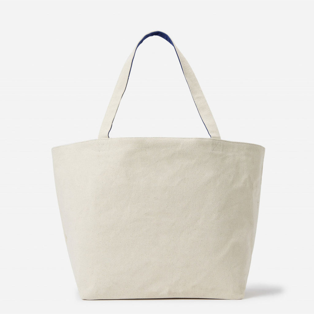 Parte trasera del bolso shopping reversible Karl Lagerfeld en color crudo.