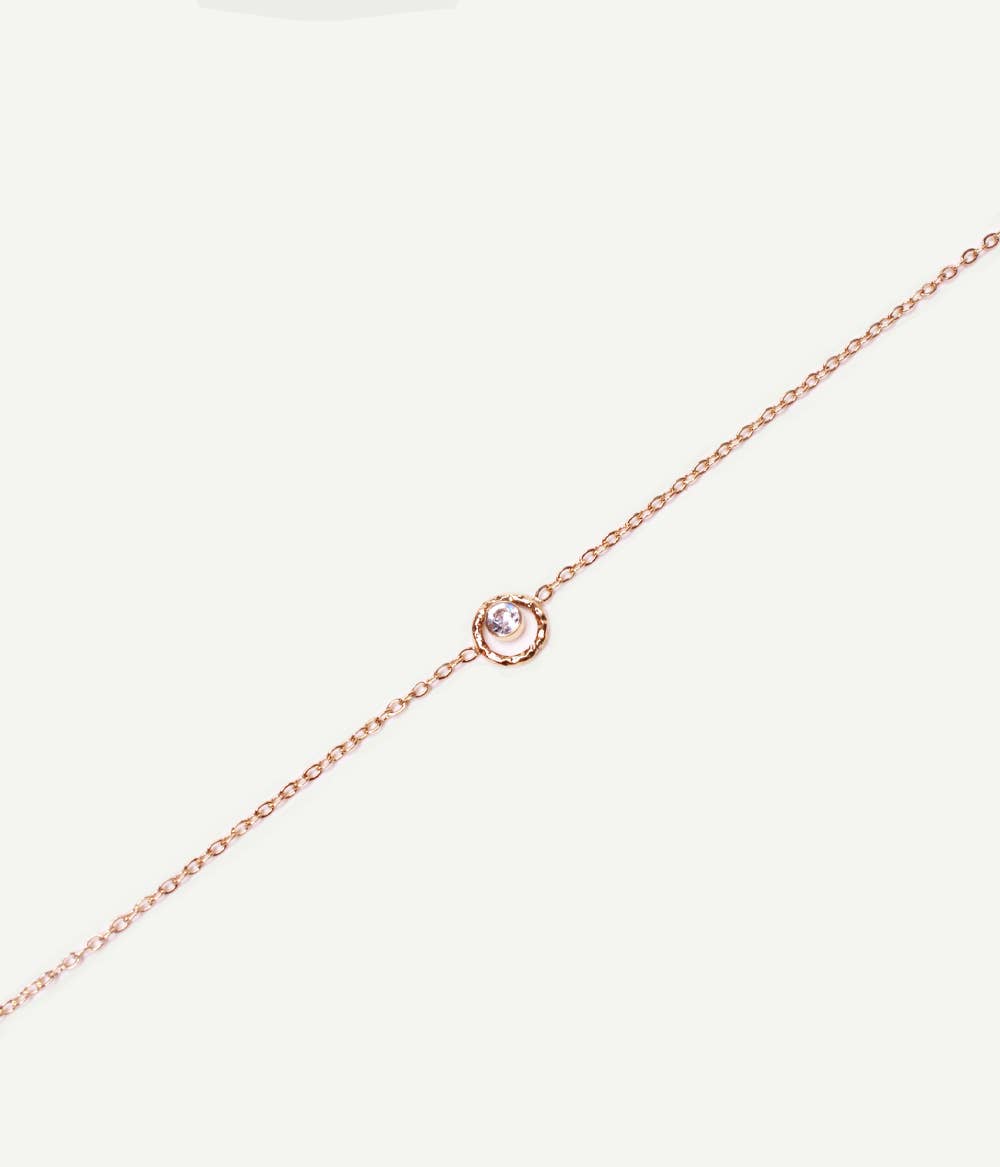 Pulsera Emma dorada con colgante brillante