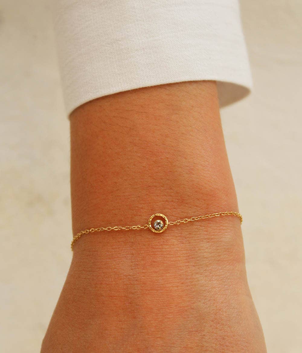 Pulsera Emma dorada con colgante brillante