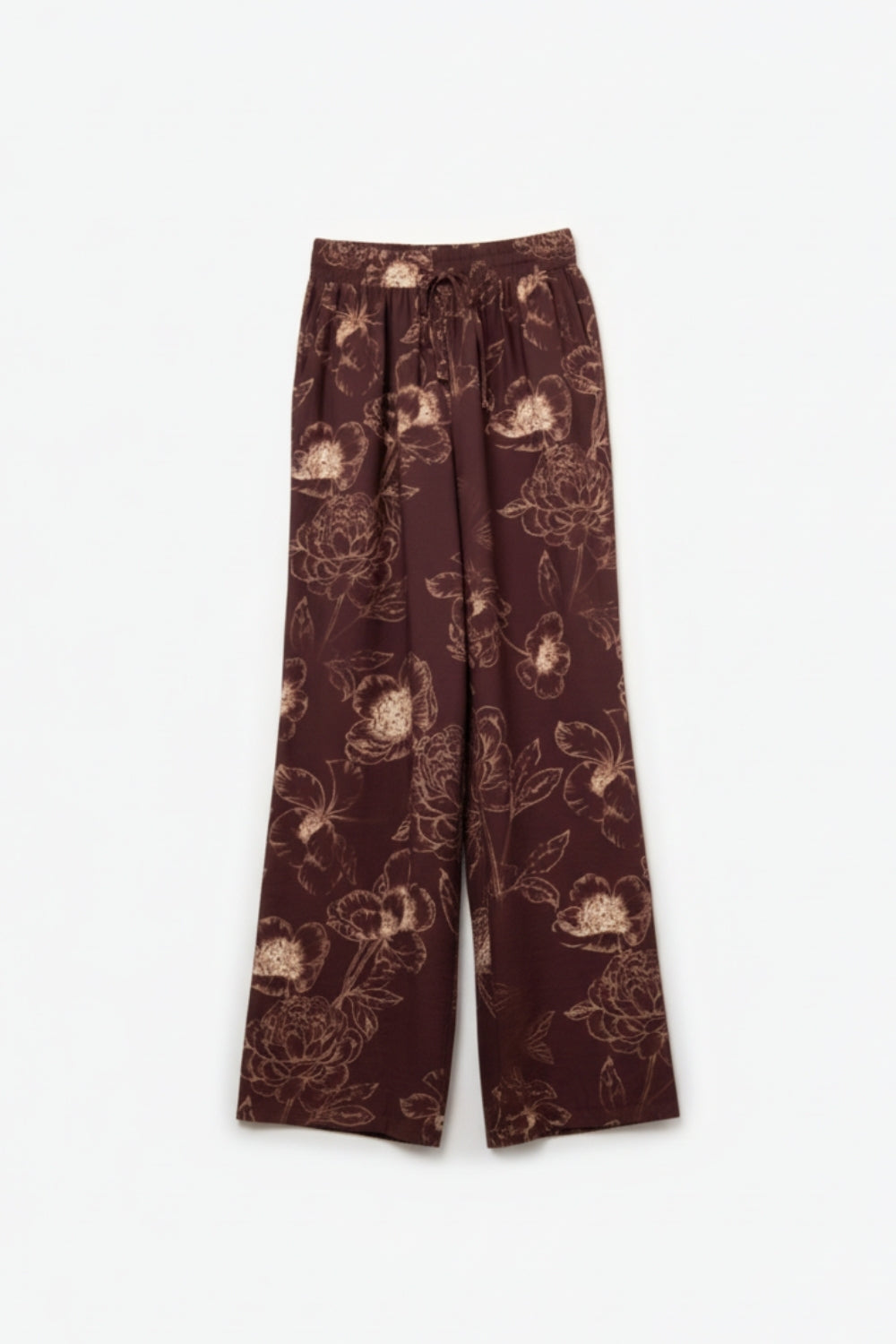 Pantalones fluidos de color burdeos con estampado floral