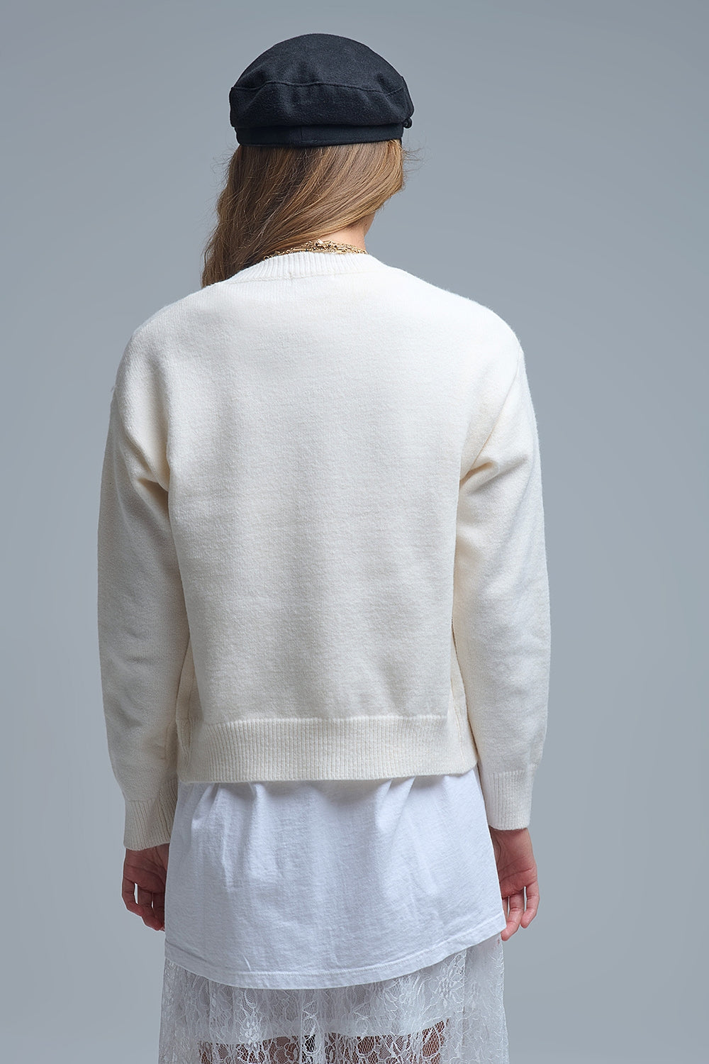 Acogedor cárdigan blanco con corazones rojos