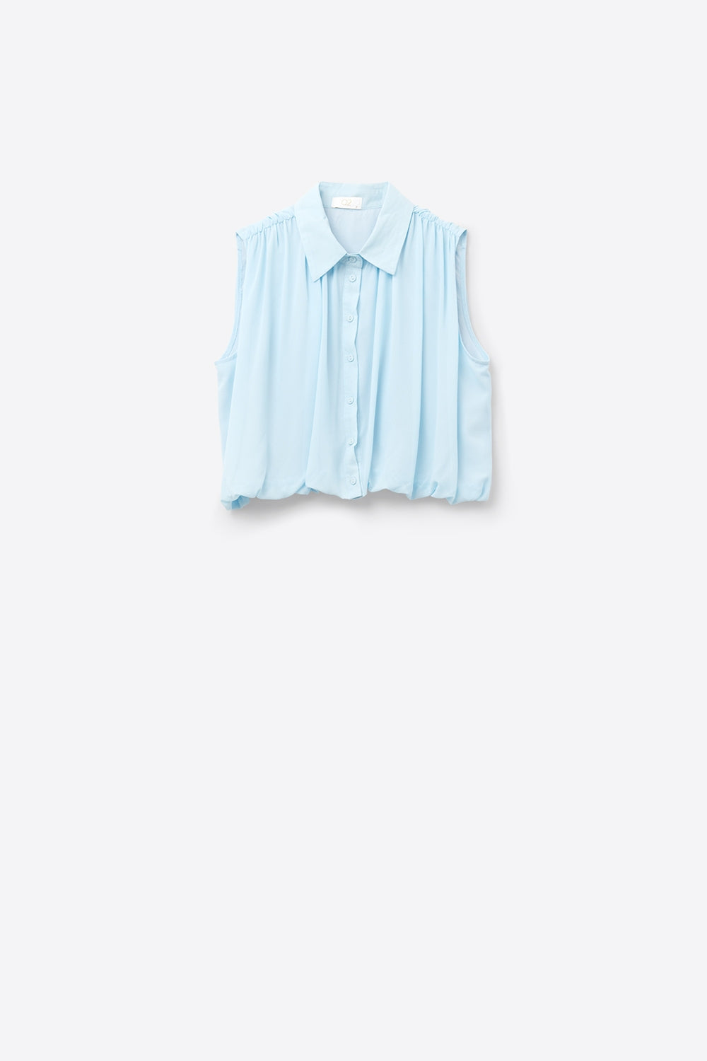 blusa de gasa azul bebé con pliegues en el bajo