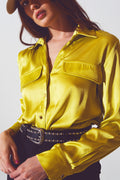 Blusa verde satinada en color lima diseño fluido