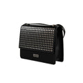 Bolso bandolera CULT negro con solapa decorada con tachuelas metálicas.