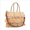 Bolso de rafia natural con flecos decorativos, encaje y correa bandolera para mujer.