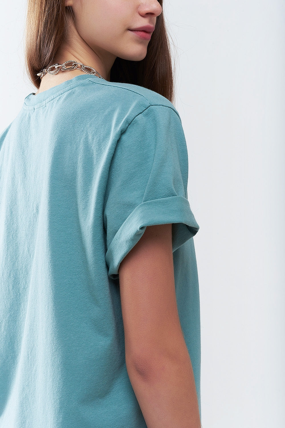 Camiseta larga suelta verde con logotipo de USA