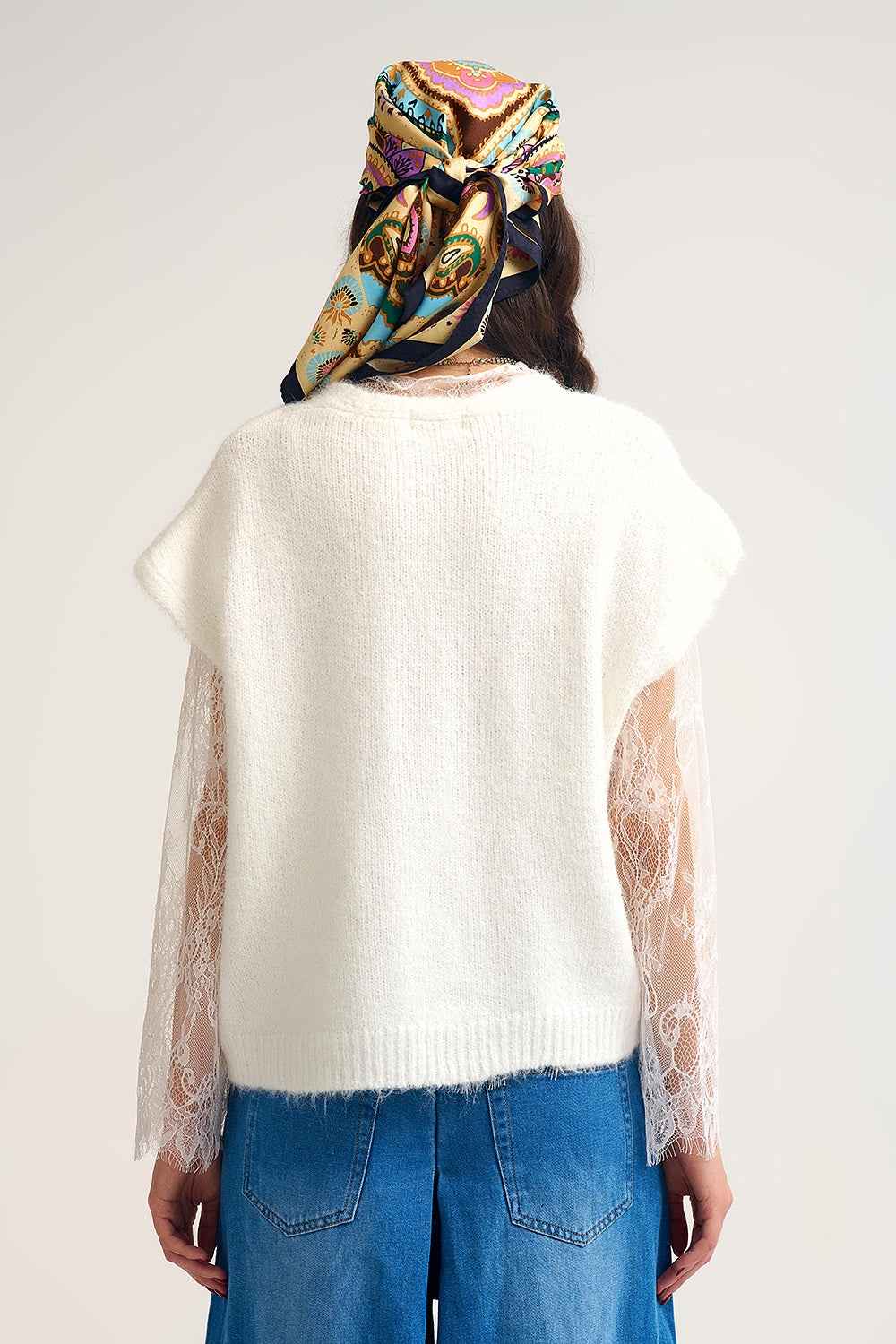 Chaleco de punto suave sin mangas con ribete de encaje
