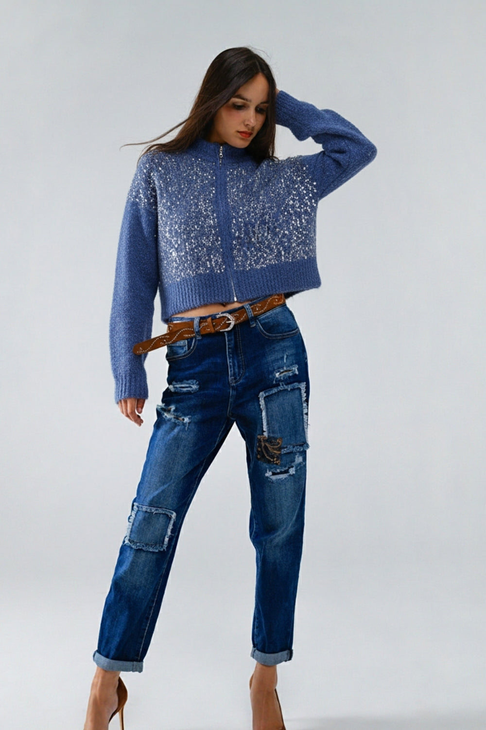 Chaqueta de punto esponjoso azul con lentejuelas y cierre de cremallera