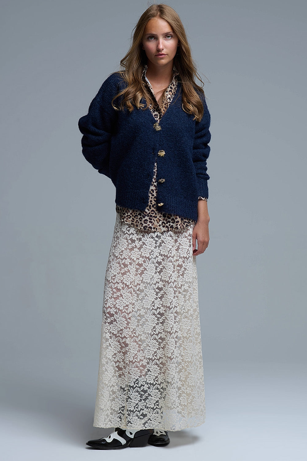 Chaqueta de punto grueso azul marino con mezcla de grandes botones dorados