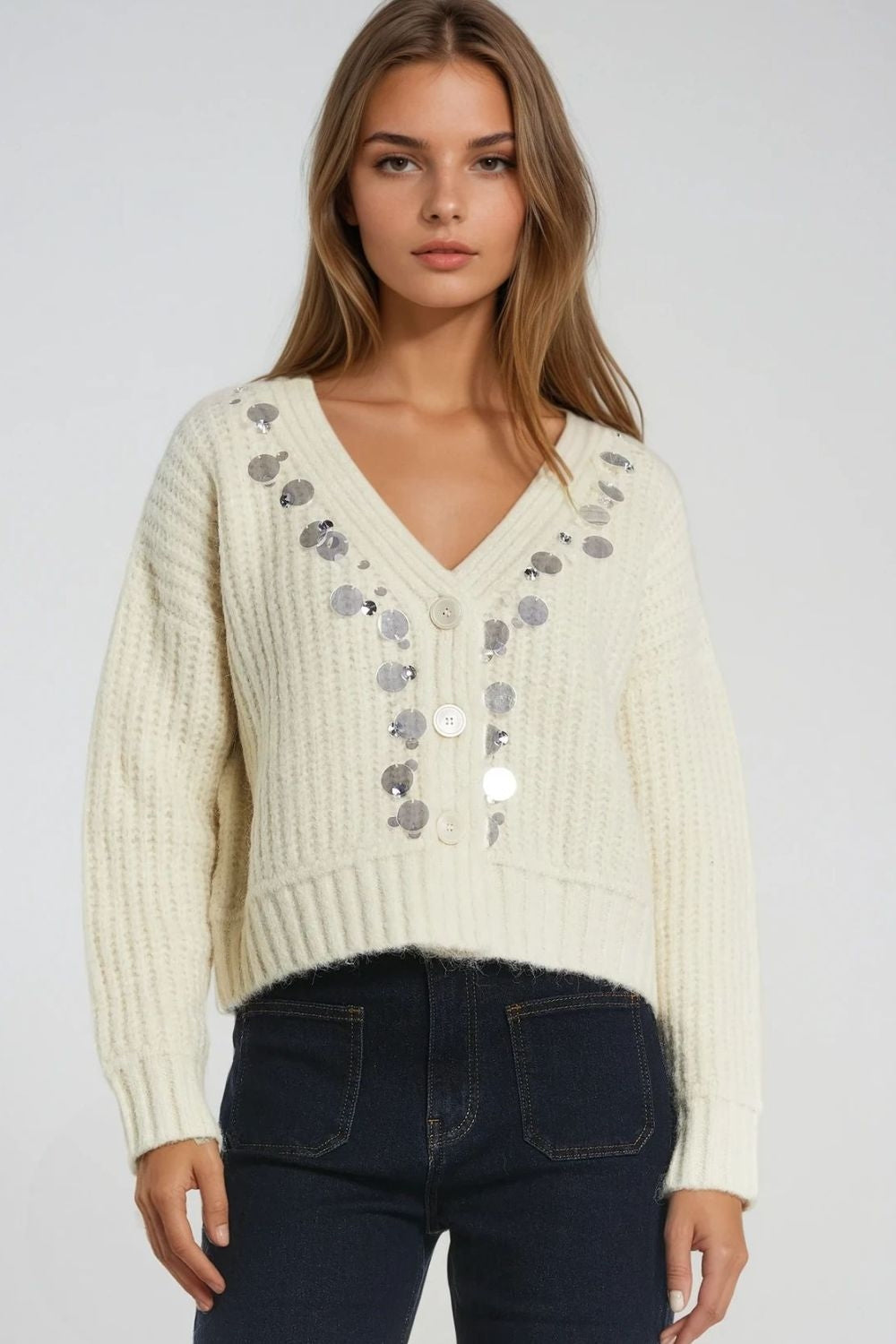Chaqueta de punto grueso con detalle de lentejuelas