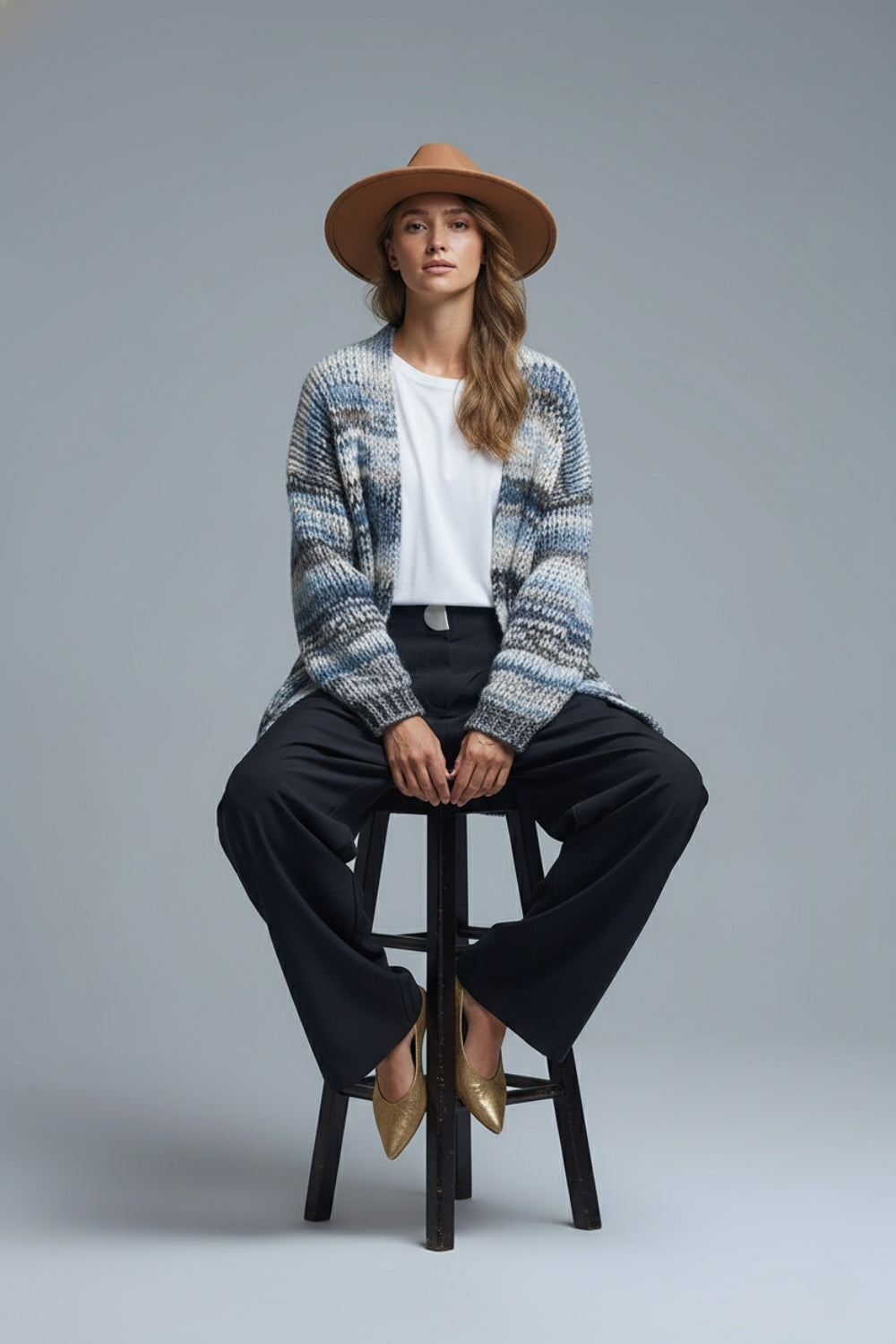 Chaqueta larga de rayas jaspeadas con bolsillos en azul