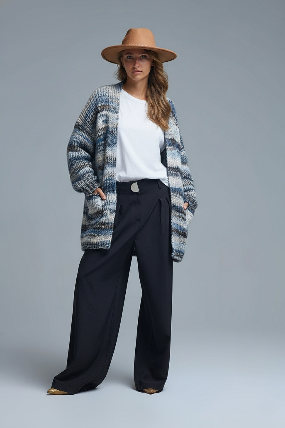 Chaqueta larga de rayas jaspeadas con bolsillos en azul