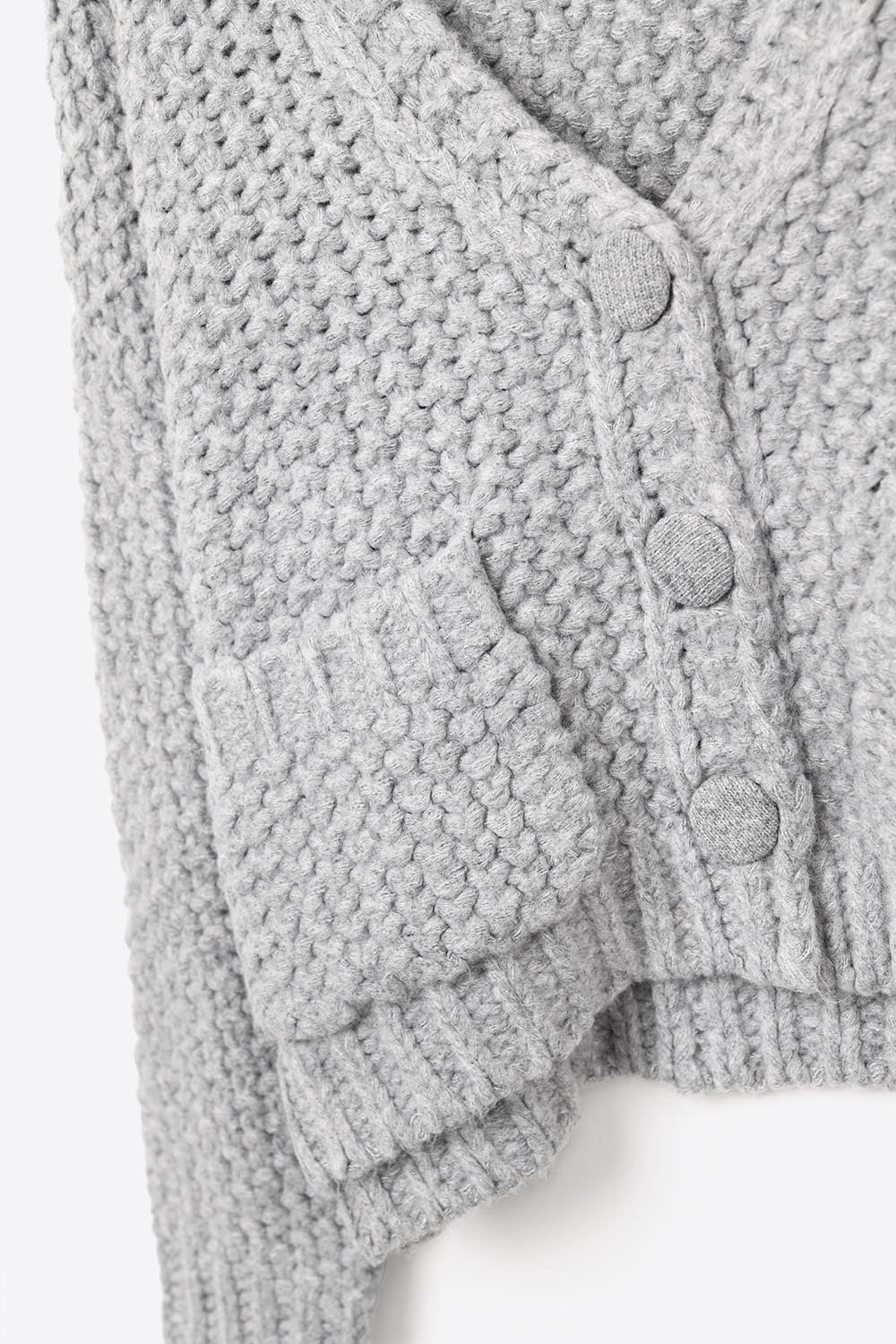 Chaqueta oversize de punto grueso gris con bolsillos