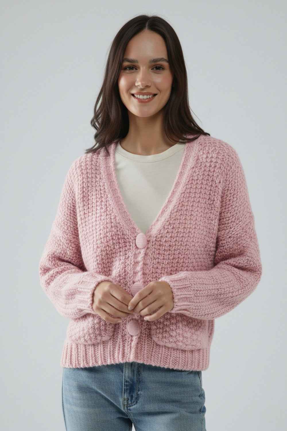 Chaqueta oversize de punto grueso rosa con bolsillos