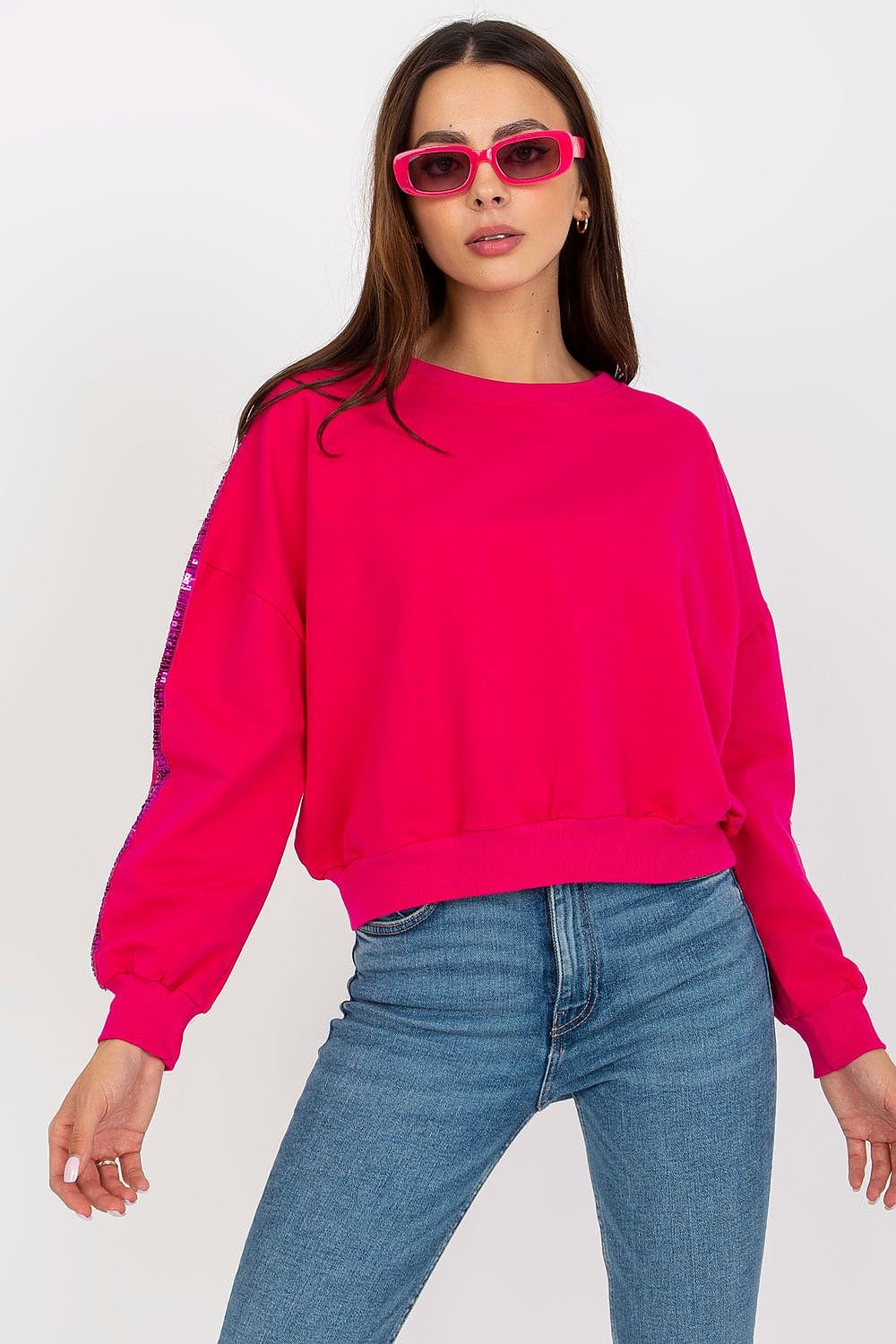 Sudadera en color Fucsia con detalle de lentejuelas en mangas - Elegancia casual