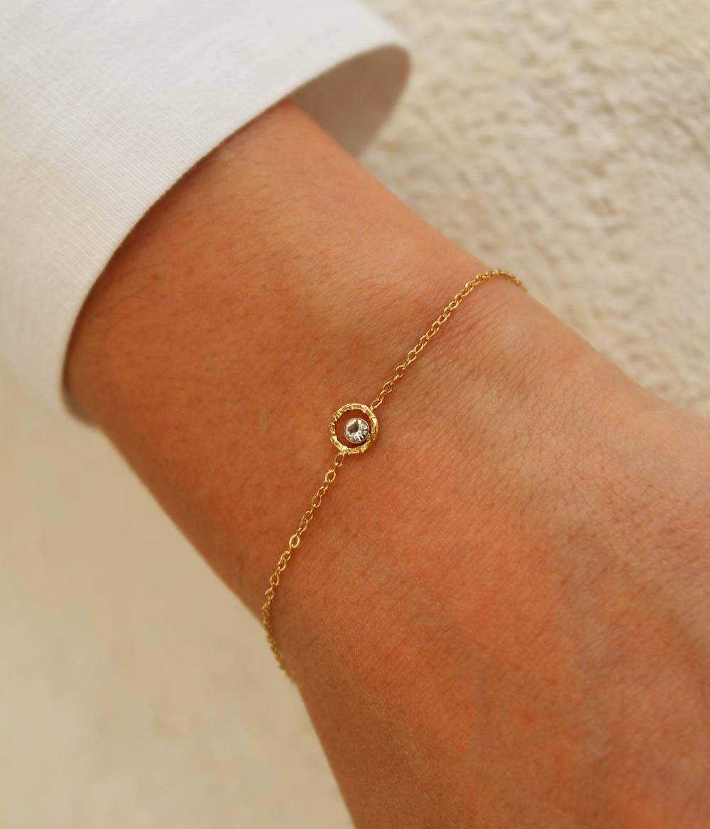 Pulsera Emma dorada con colgante brillante
