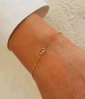 Pulsera Emma dorada con colgante brillante