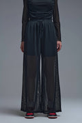 Q2 Elegantes pantalones negros de lunares transparentes