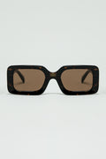 gafas de sol cuadradas marrones con estampado animal verde en el lateral