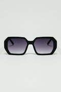 Gafas de sol negras en forma de diamante y detalle dorado