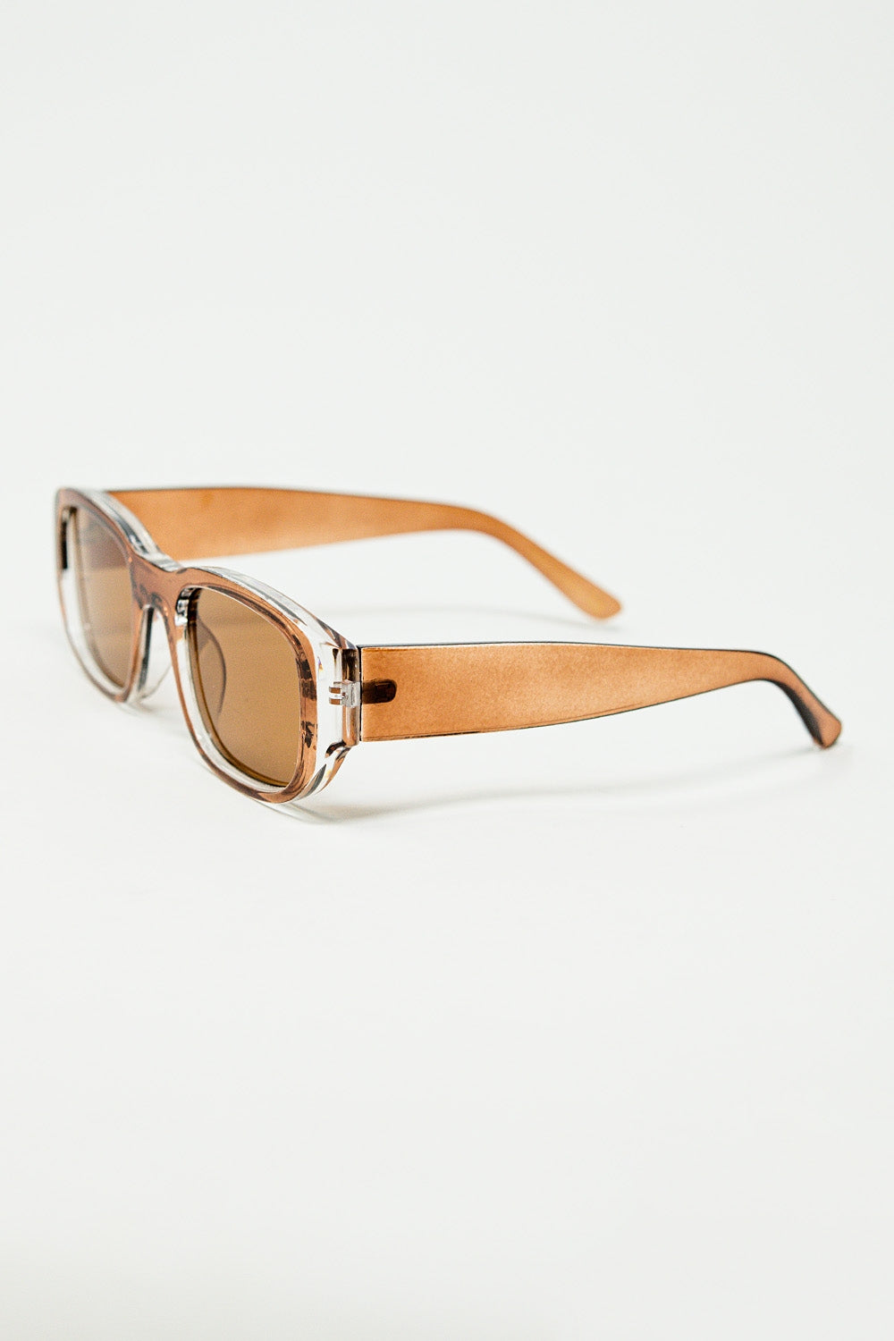 Gafas de sol ovaladas con montura camel transparente de alto brillo