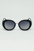 Gafas de sol ovaladas negras con detalle metálico dorado