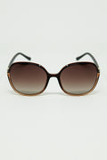 Gafas de sol redondas en color caramelo con detalle metálico dorado