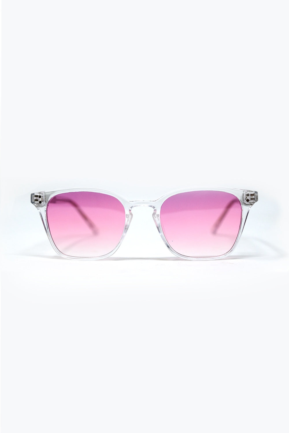 Gafas de sol cuadradas con montura transparente y lentes rosa degradadas vista frontal.