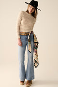 Jeans acampanados de lavado claro hechos de denim de alta calidad