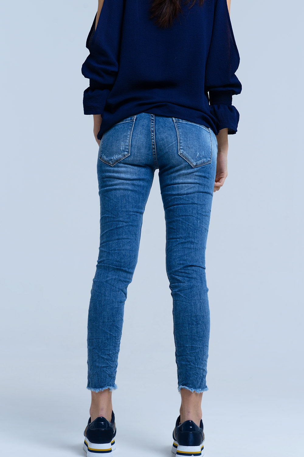 Jeans con detalle de roturas
