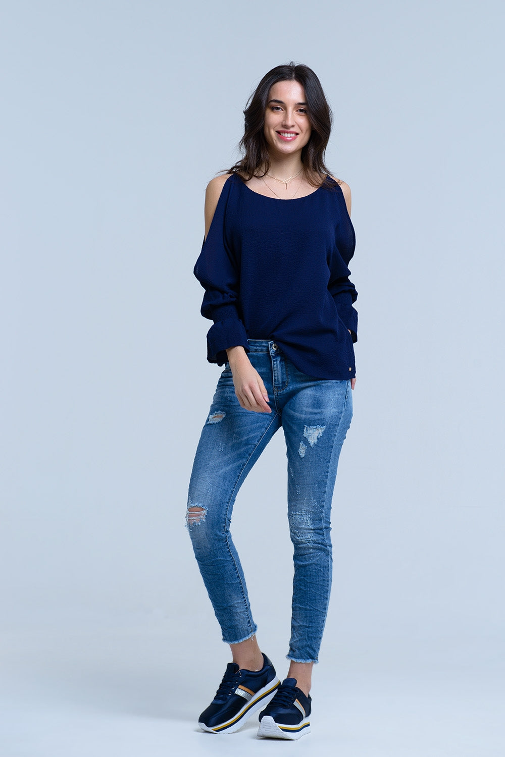 Jeans con detalle de roturas