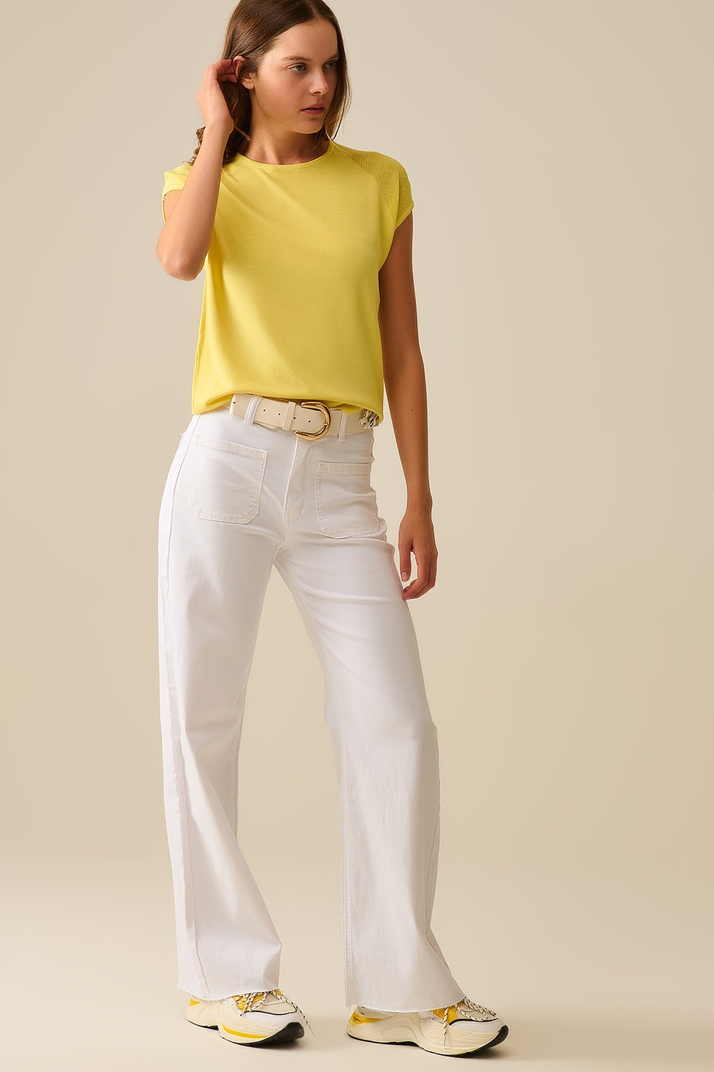 Jersey amarillo de manga corta con malla de punto en el hombro