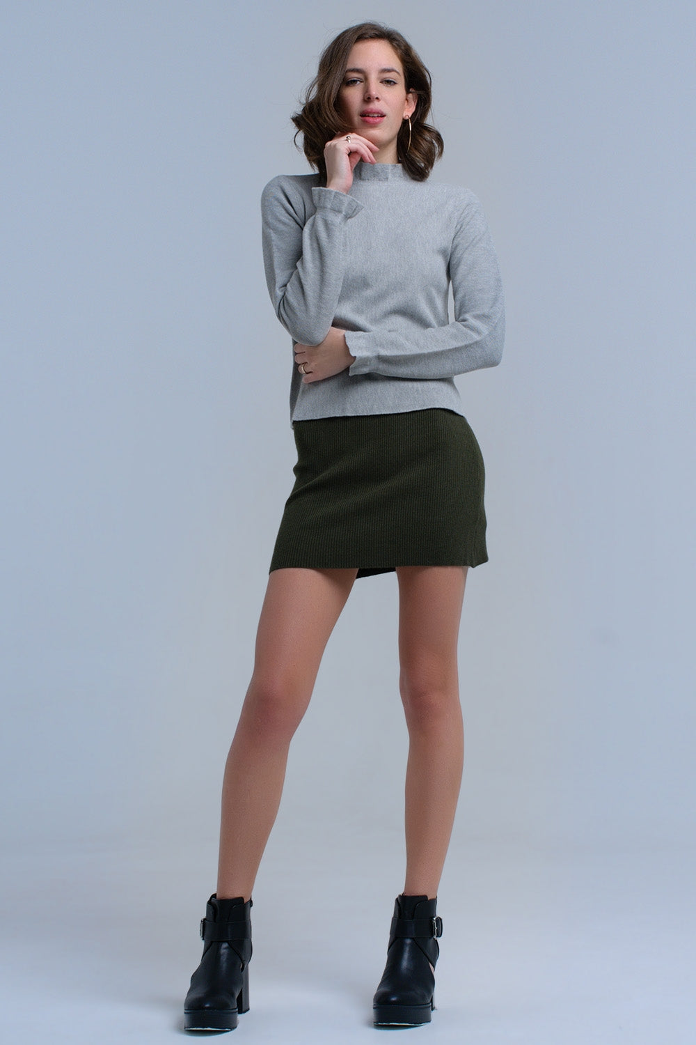 Jersey con volantes en gris