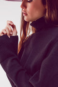Jersey cropped de cuello alto en negro