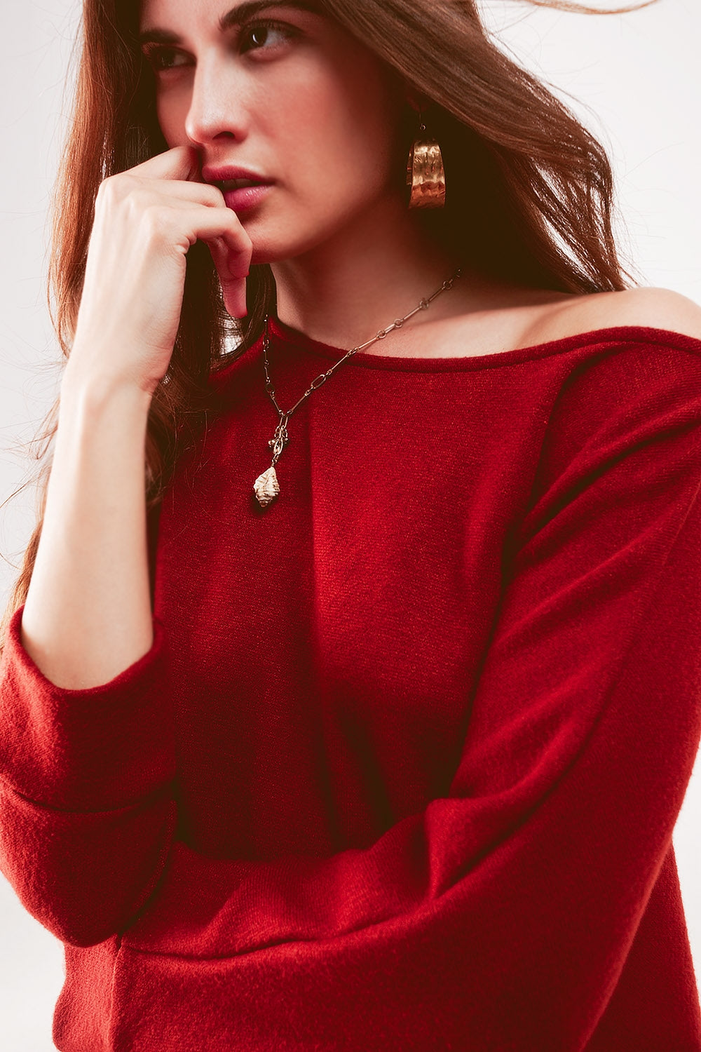 Jersey cuello barco con mangas de murciélago en naranja rojizo