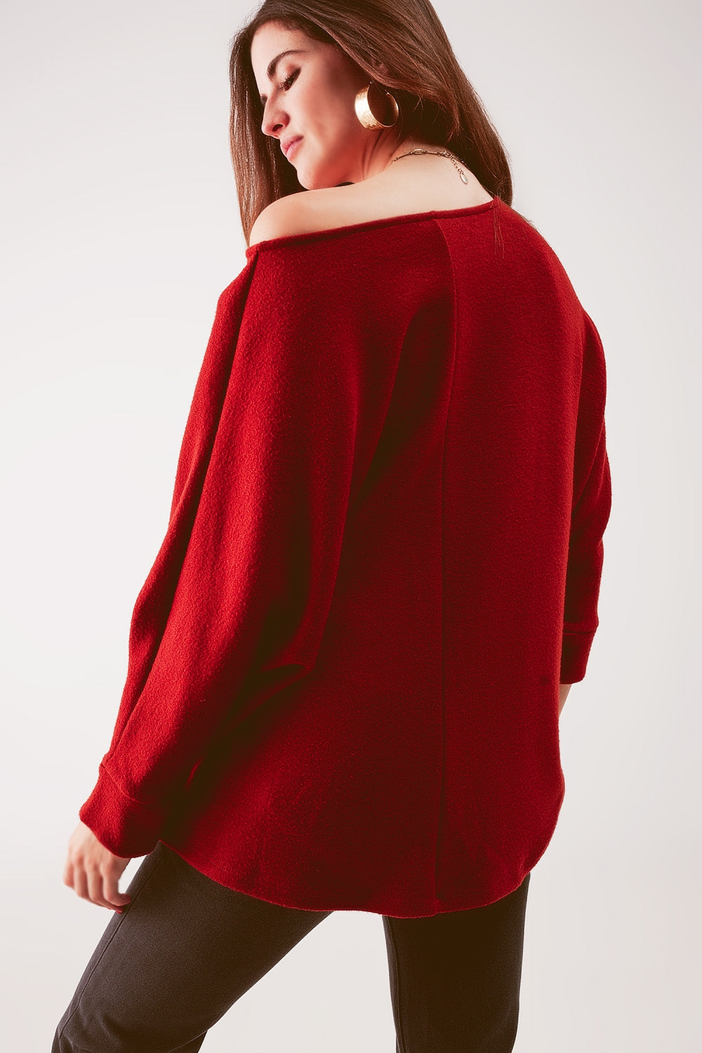 Jersey cuello barco con mangas de murciélago en naranja rojizo