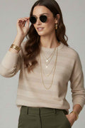 Jersey de punto a rayas color crema con detalle de lentejuelas