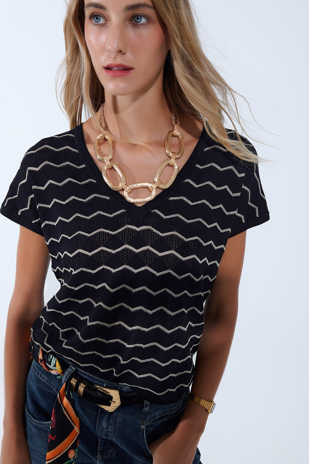 Jersey de punto con cuello en V y mangas caídas Zigzag en negro