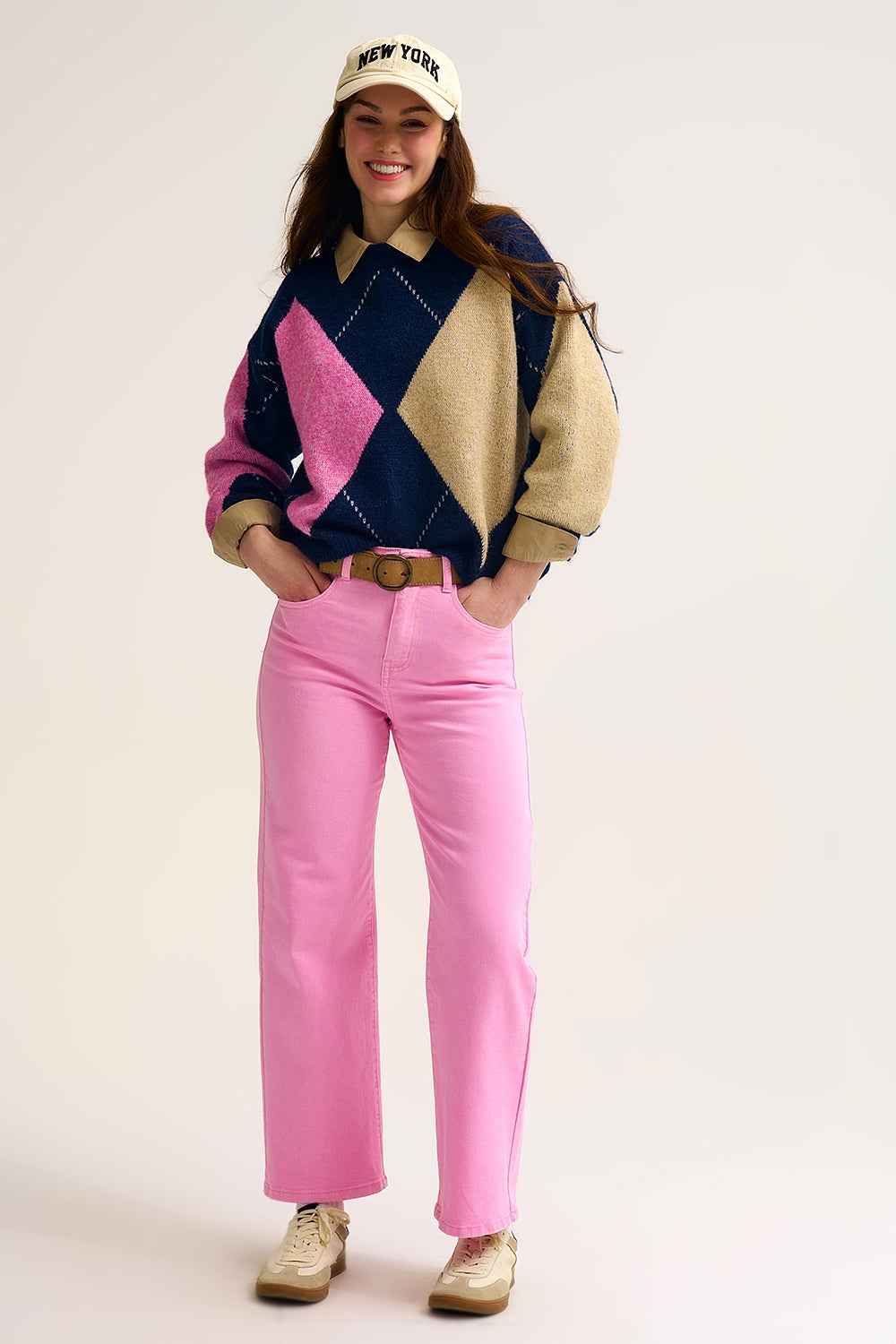 Jersey de punto rombis azul marino con bloques de color en contraste rosa y beige