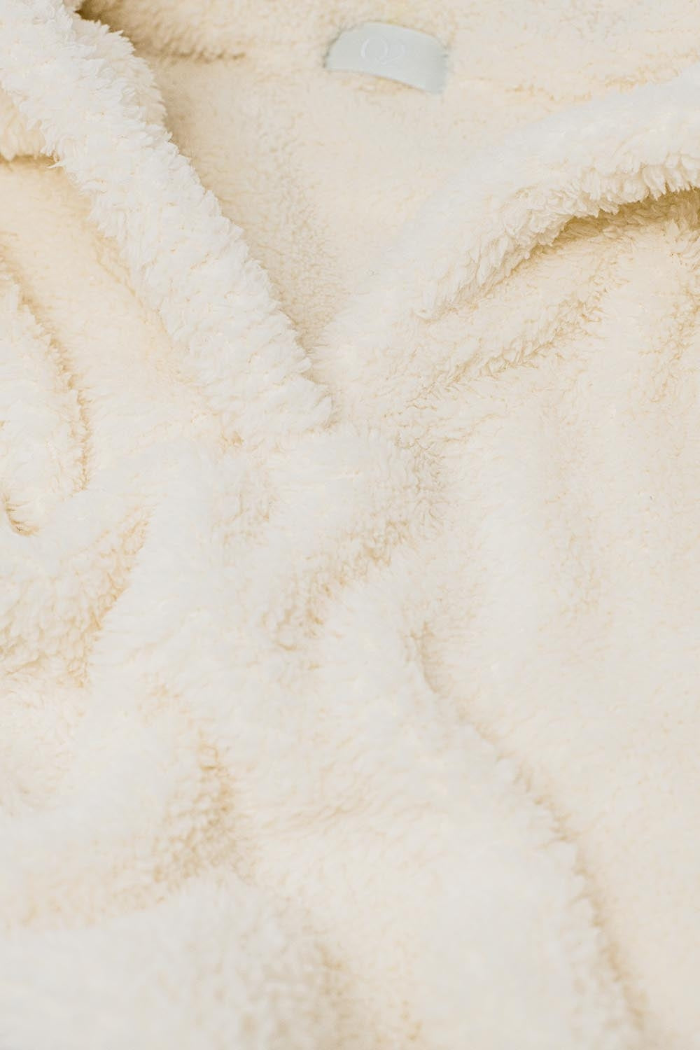 jersey esponjoso cuello pico crudo