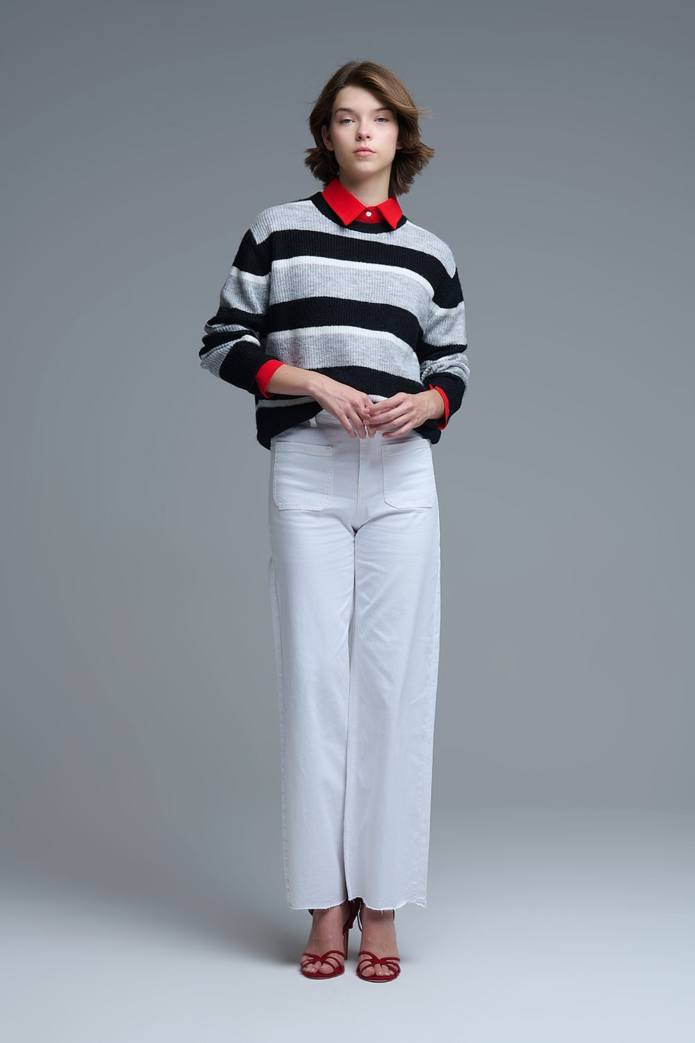 Jersey negro con rayas blancas y grises