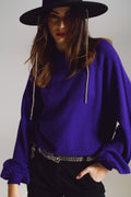 Jersey morado de estilo relajado con mangas globo