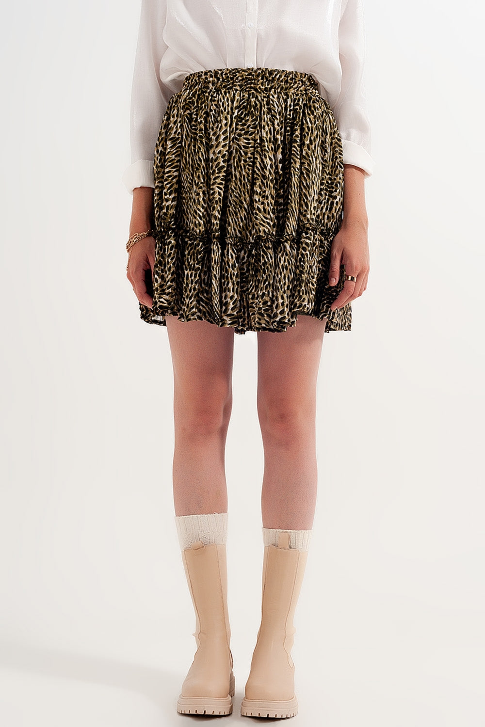 Mini falda de gasa verde con cintura elastica y tejido brillante