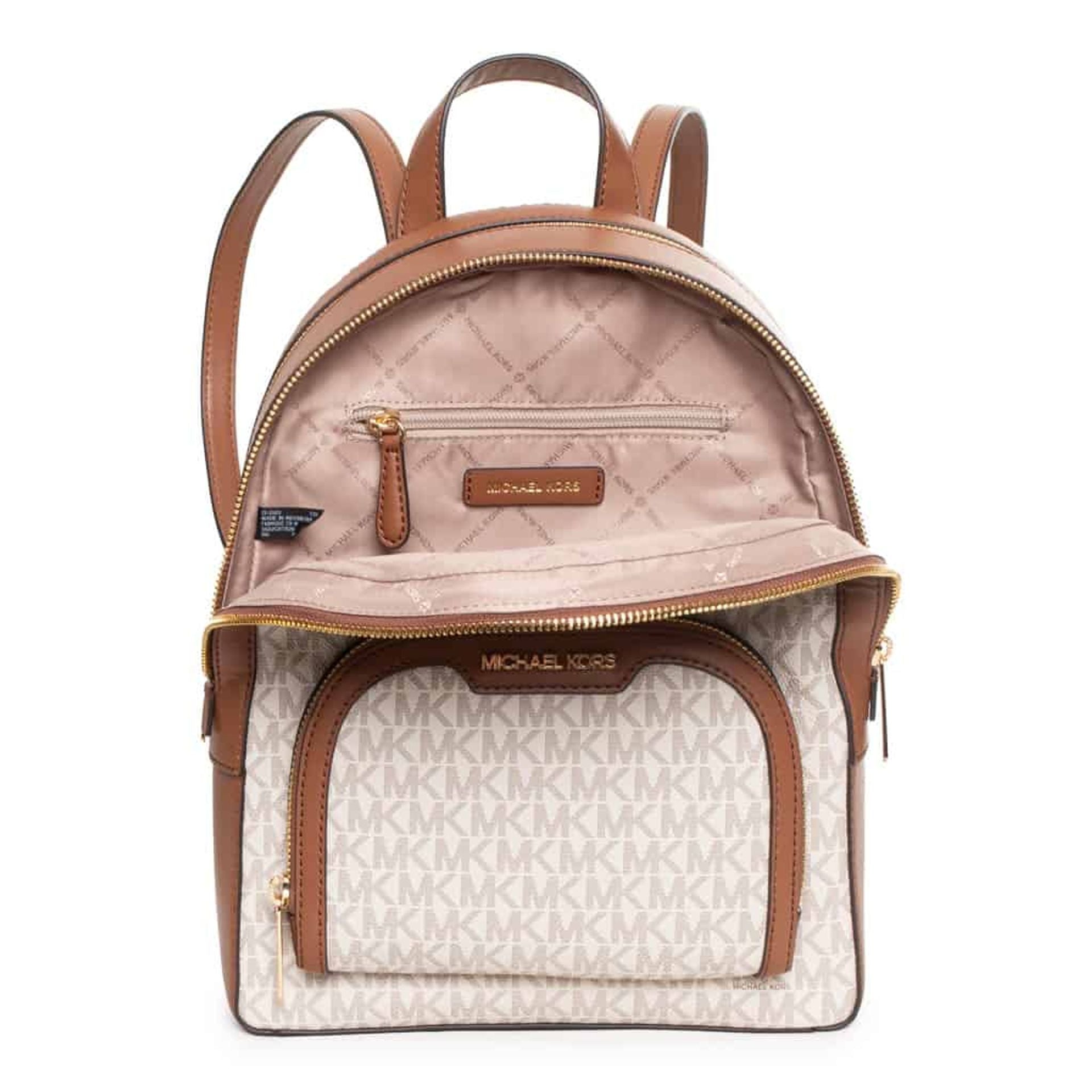 Interior de la mochila Michael Kors beige con compartimento amplio y bolsillo con cremallera