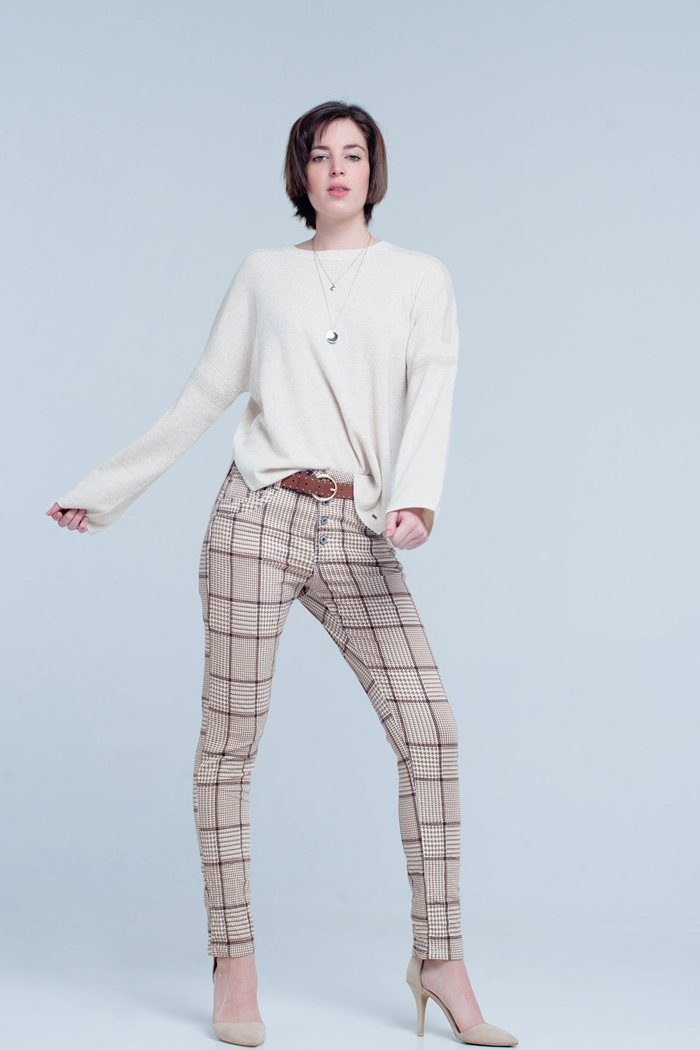 Pantalon de cuadros en beige con botones