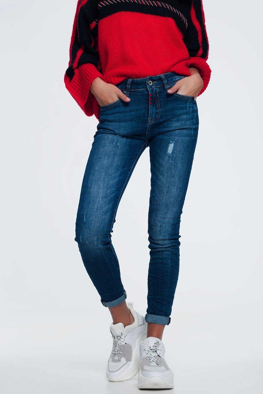 Pantalon vaquero slim con detalle de hilo en colores