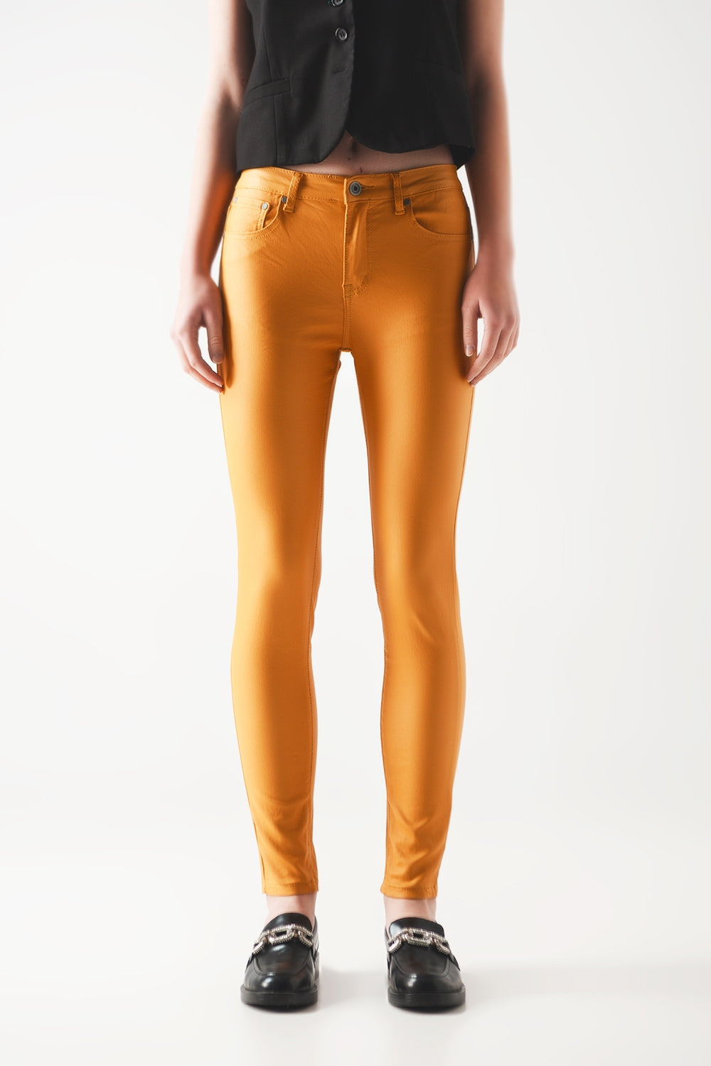 Pantalones ajustados de talle alto en naranja