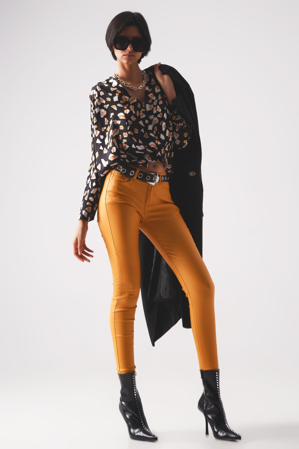 Pantalones ajustados de talle alto en naranja
