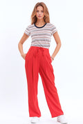 Pantalones en coral con bolsillos delanteros y cierre de cordón